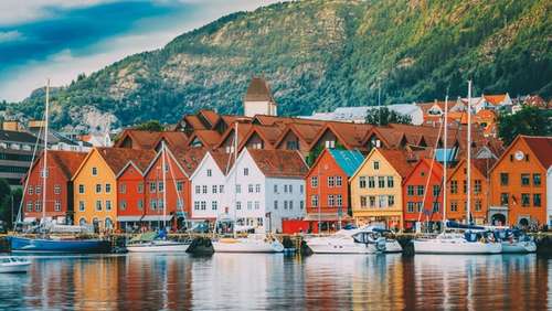 A row of colourful buildings a long the Bergen pier.