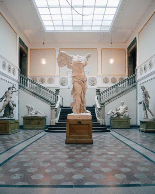 A statue of a winged human figure.