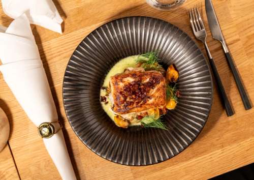 Food in a bowl on a table.