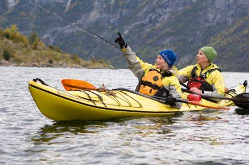 To people in a yellow kayak.
