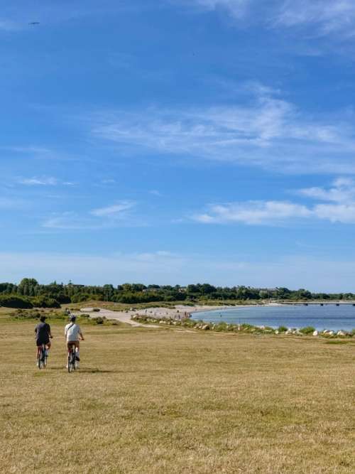 To people cycling towards Ribersborg Beach.