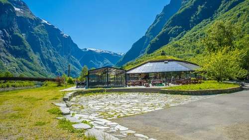 Hotel near green mountains.