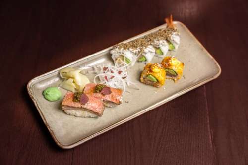 Colorful and tasty sushi served at the table.