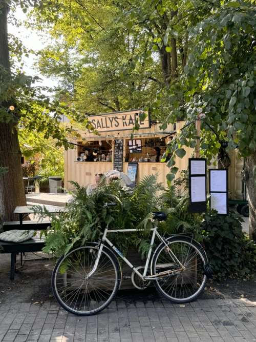 A parked bicycle outside one of the cafés in Folkets Park.