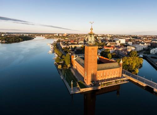 Stockholm and city hall with a view from the city in late summer night